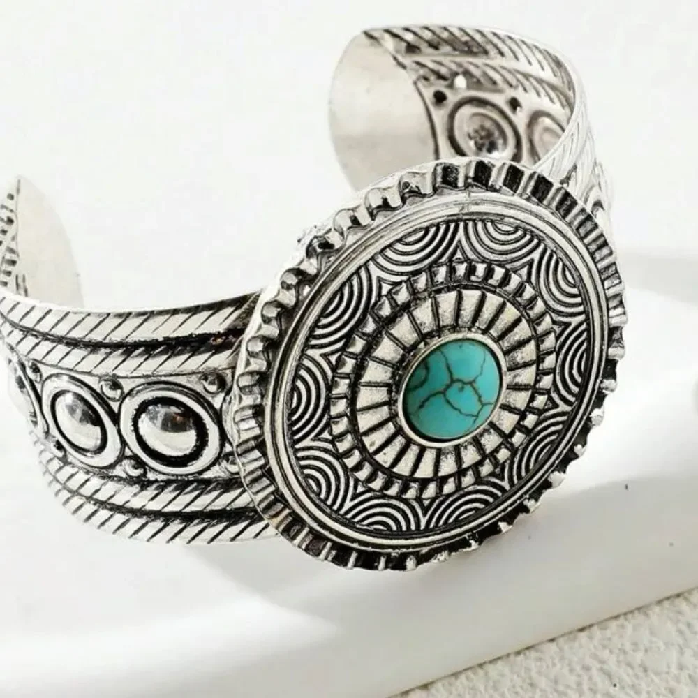 Beautiful intricate design silver cuff bracelet with turquoise stone center! New